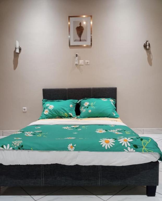 Postel nebo postele na pokoji v ubytování At Home