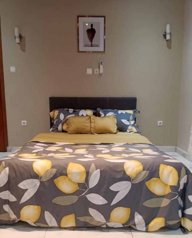 Postel nebo postele na pokoji v ubytování At Home