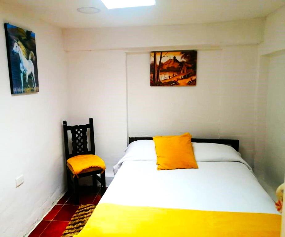 Postel nebo postele na pokoji v ubytování Galapagos Natural Life Hostel