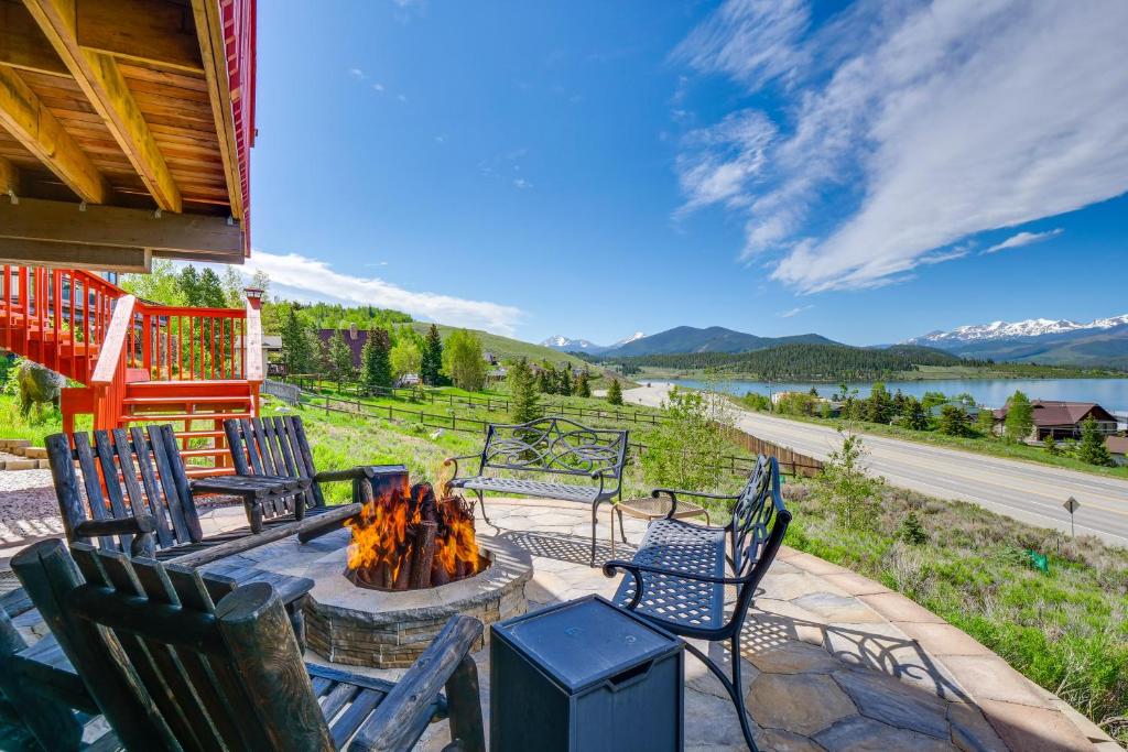 a group of chairs sitting around a fire pit at Dillon Vacation Rental Hot Tub and Beautiful Views! in Dillon
