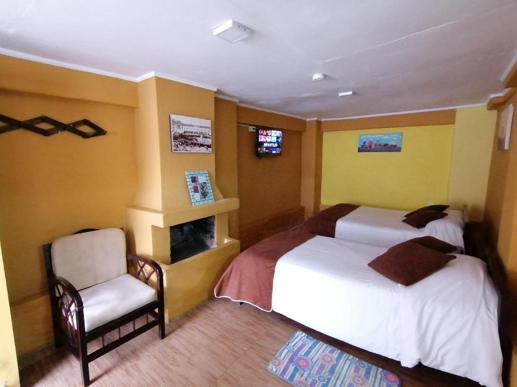 Postel nebo postele na pokoji v ubytování Galapagos Natural Life Hostel