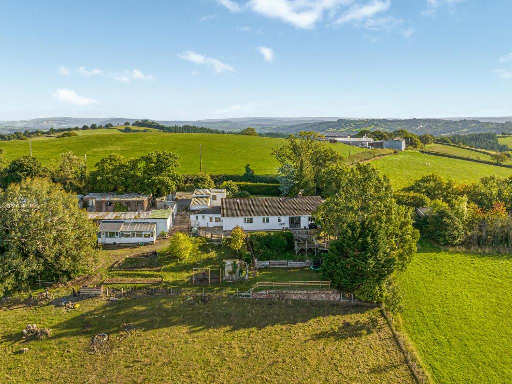 an aerial view of a large house in a field at High Meadow in Whitestone