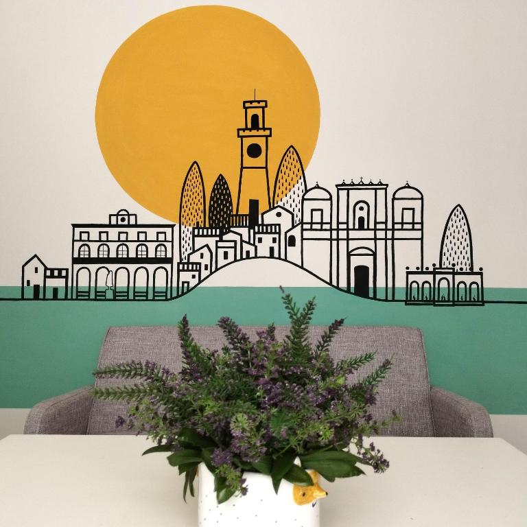 un paisaje urbano de pegatina de vinilo london en una sala de estar en Casa Girolamo en Acquapendente