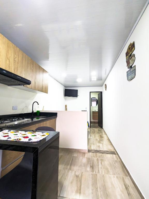 Kuchyň nebo kuchyňský kout v ubytování Apartaestudio para estrenar La Quinta
