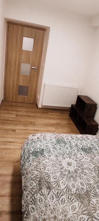 Postel nebo postele na pokoji v ubytování Apartmány Kristýna