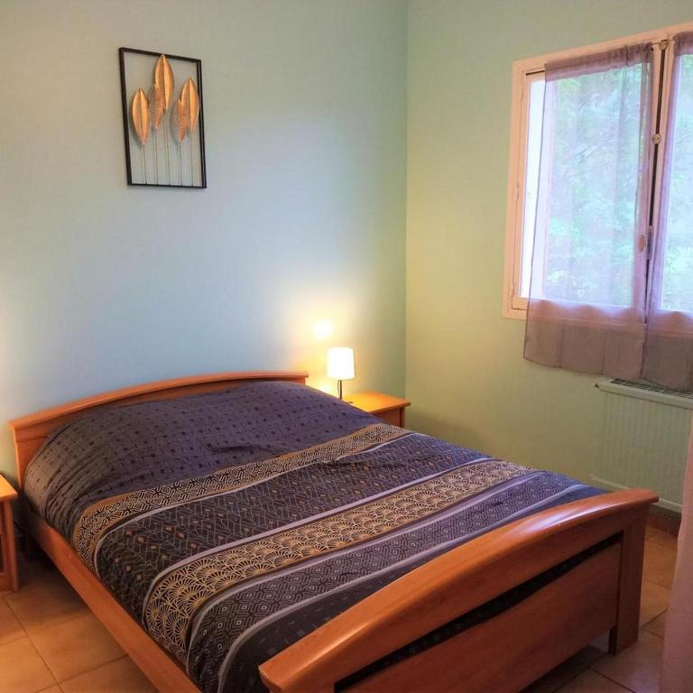 Postel nebo postele na pokoji v ubytování Gîte du petit chemin