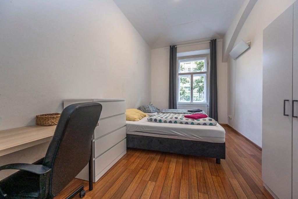 Postel nebo postele na pokoji v ubytování Apartment Americká 8