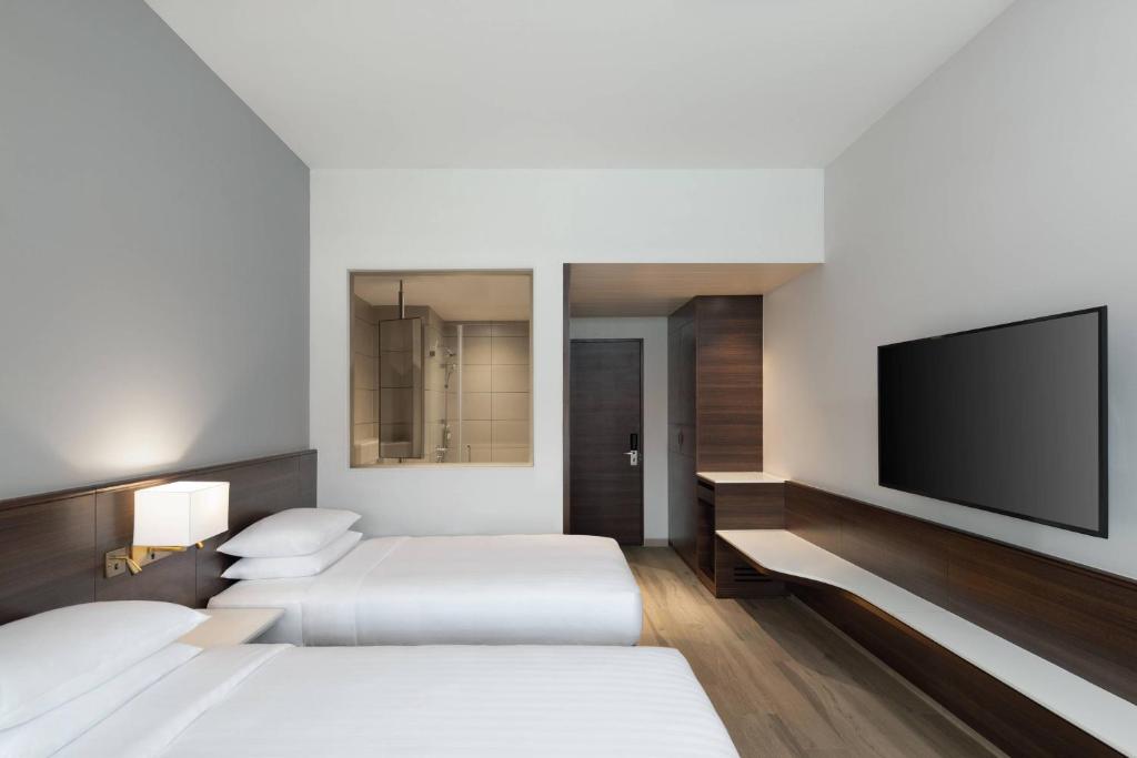Postel nebo postele na pokoji v ubytování Fairfield by Marriott Goa Benaulim