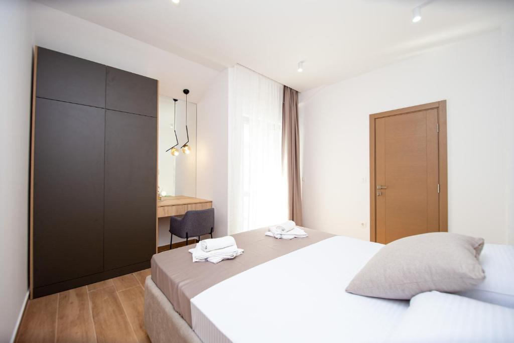Letto o letti in una camera di Apartments Sirena - Modern stay with free parking