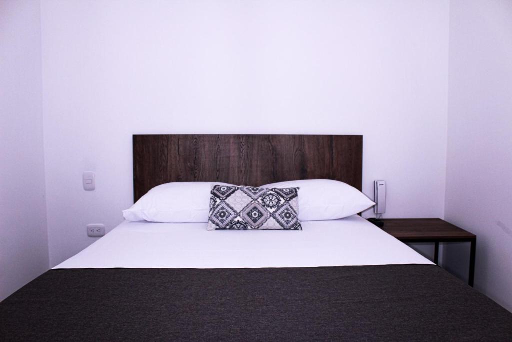 Postel nebo postele na pokoji v ubytování Ayenda Hotel MM