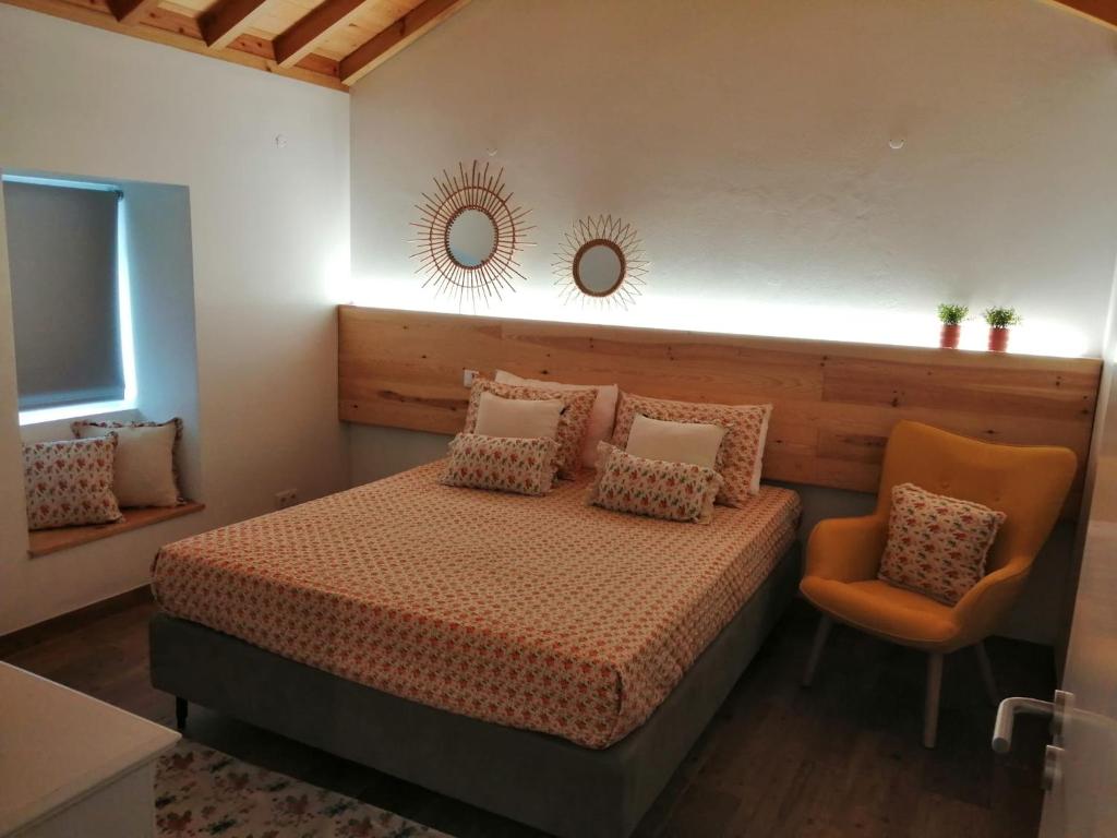Postel nebo postele na pokoji v ubytování Ti Chôa - Casa da Mata