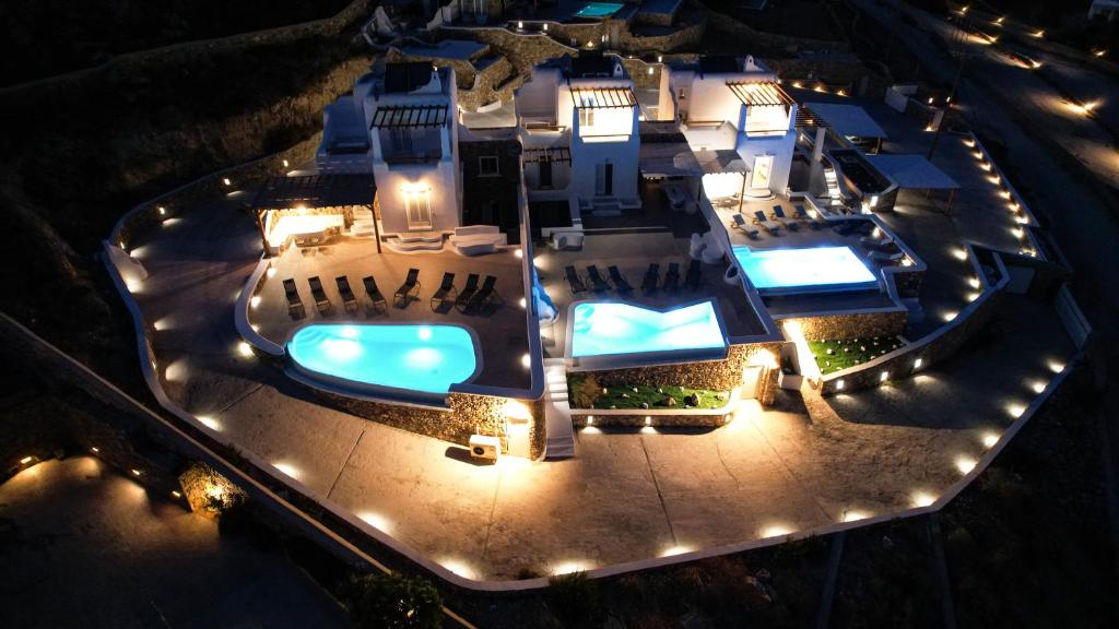 an aerial view of a house at night at Elia Spirit Villas and Suites by Live&Travel in Elia Beach