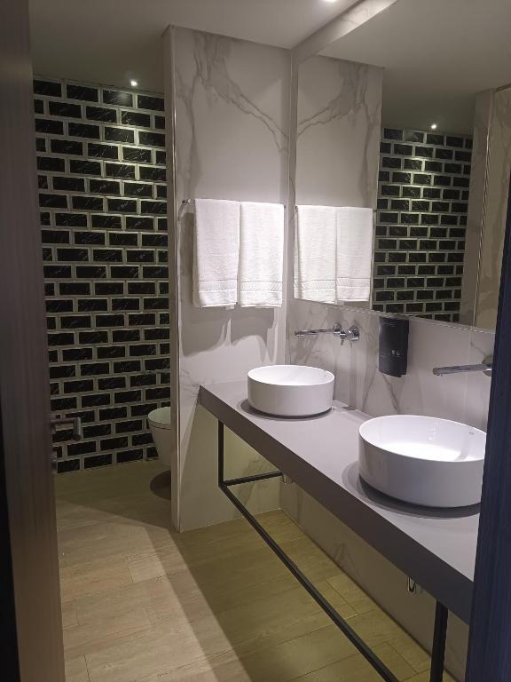 Koupelna v ubytování BrandApartments
