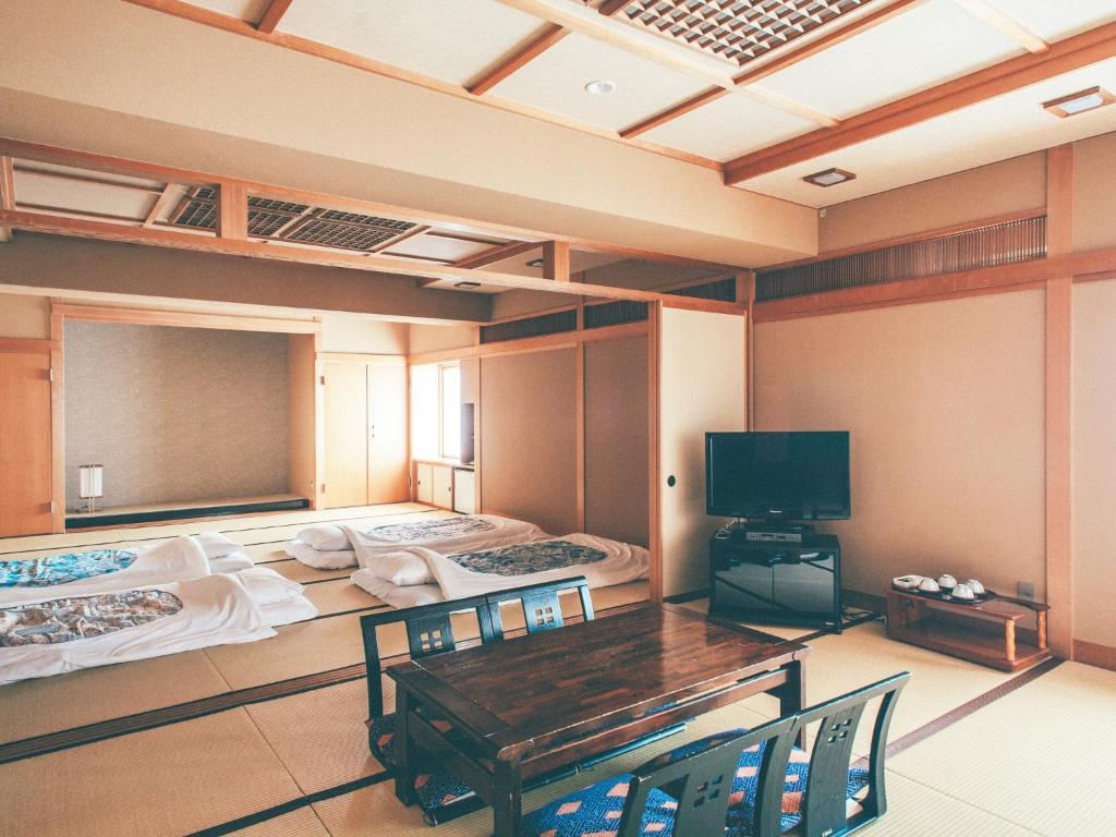 TV a/nebo společenská místnost v ubytování Kanazawa Kokusai Hotel