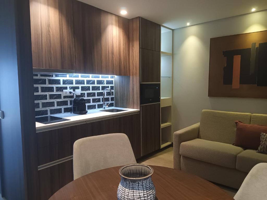Kuchyň nebo kuchyňský kout v ubytování BrandApartments