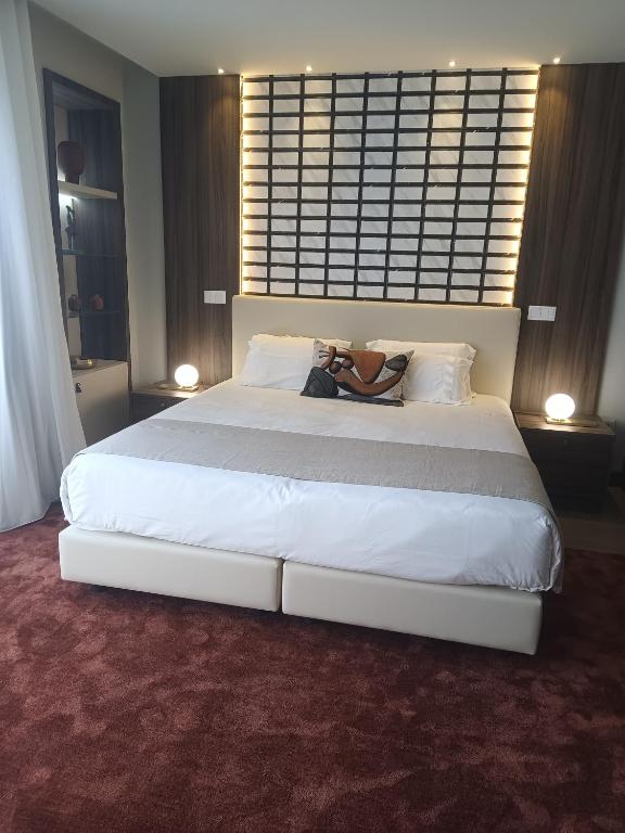 Postel nebo postele na pokoji v ubytování BrandApartments