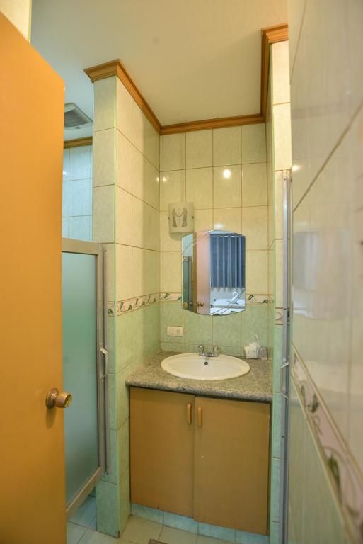 Koupelna v ubytování Amax Inn Makati