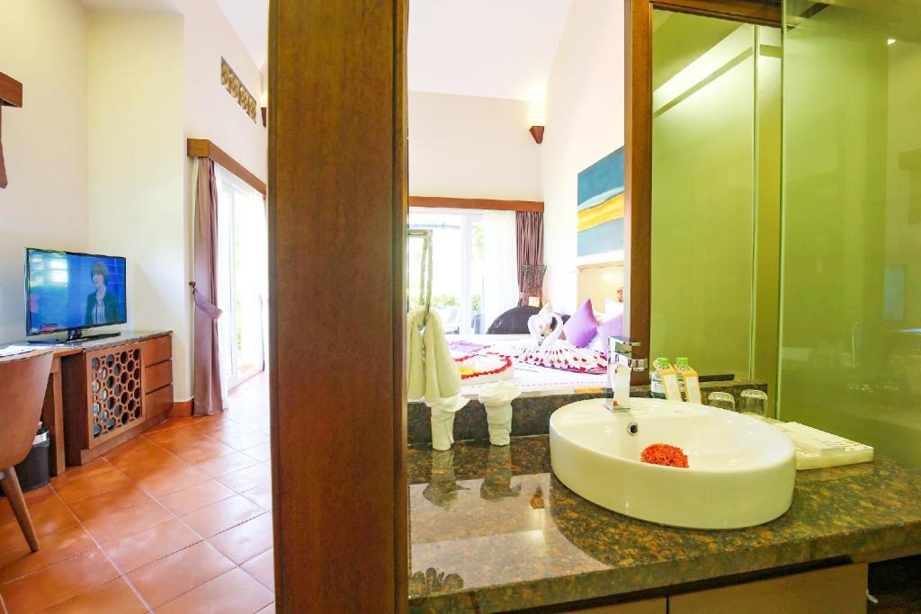 TV a/nebo společenská místnost v ubytování Mercury Phu Quoc Resort & Villas