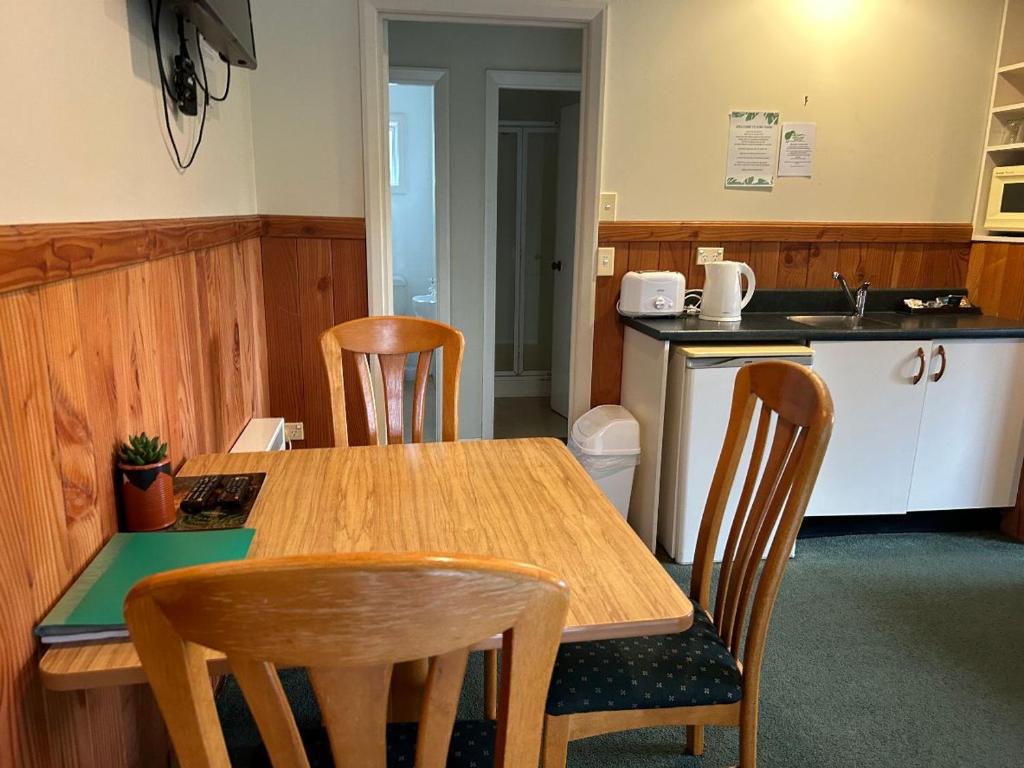 Kuchyň nebo kuchyňský kout v ubytování Kiwi Park Motels