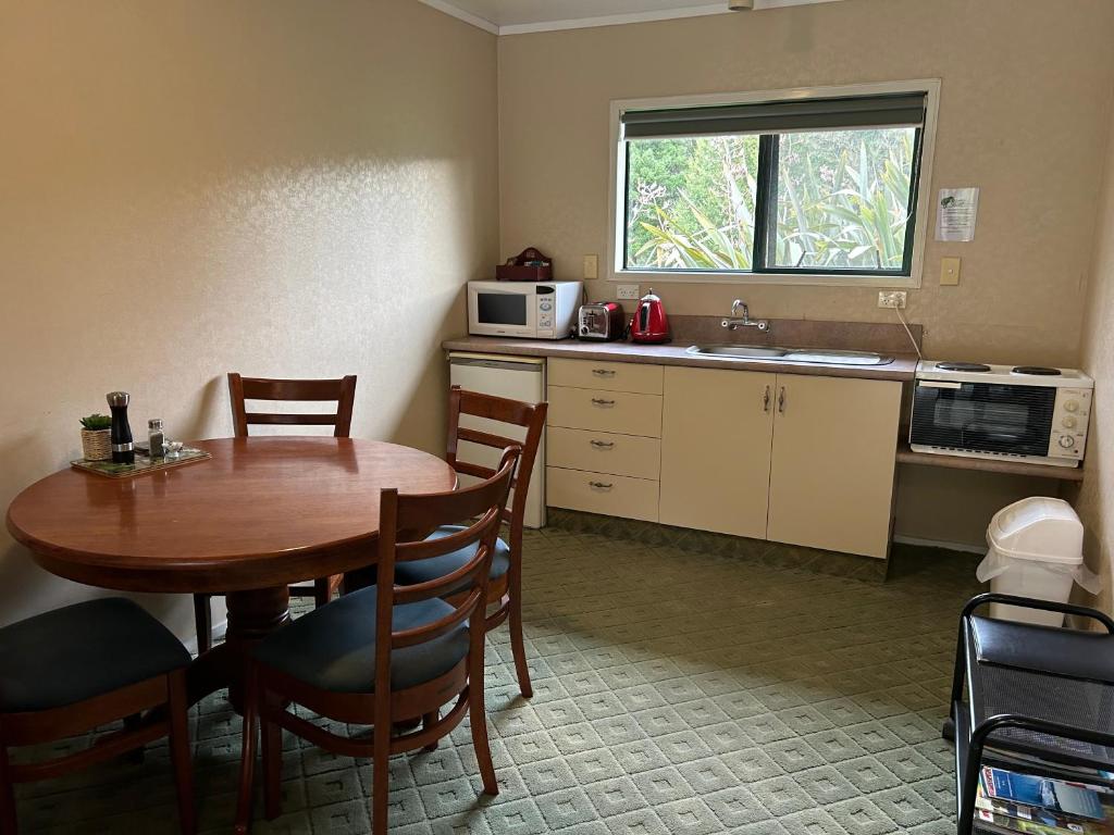 Kuchyň nebo kuchyňský kout v ubytování Kiwi Park Motels