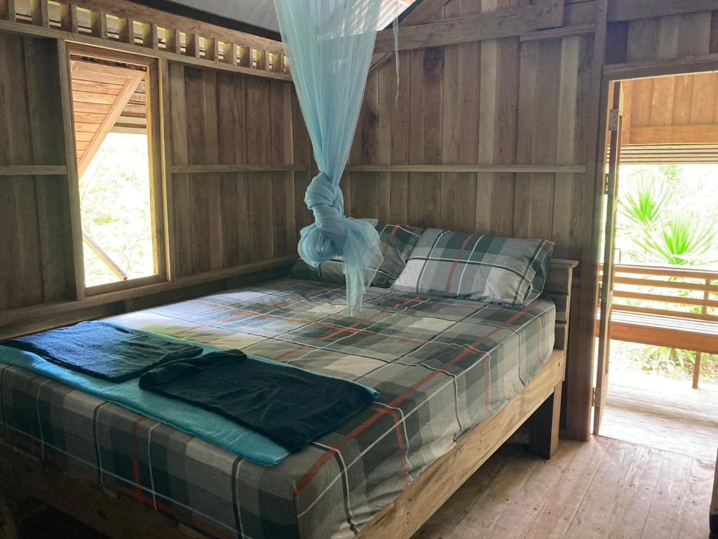 Postel nebo postele na pokoji v ubytování Toh Tao Homestay