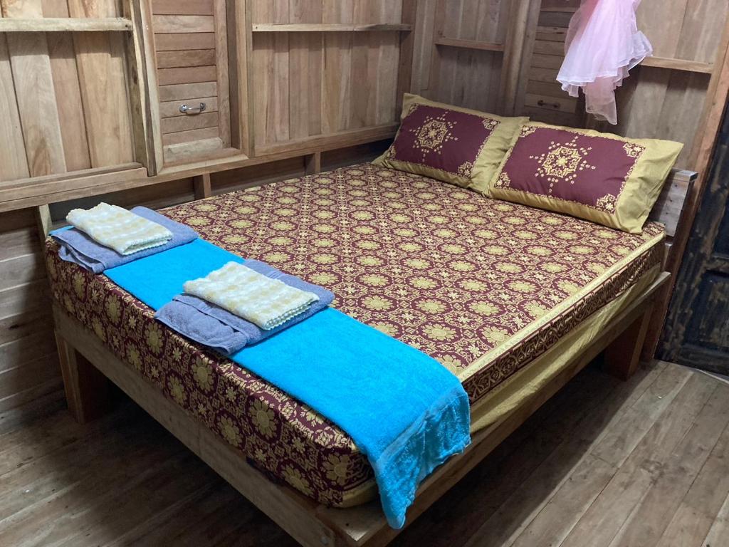 Postel nebo postele na pokoji v ubytování Toh Tao Homestay