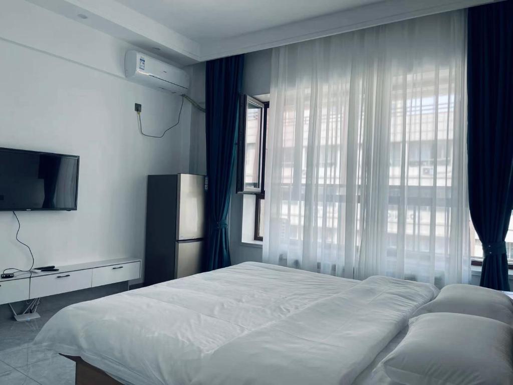 Letto o letti in una camera di Utopia Apartment