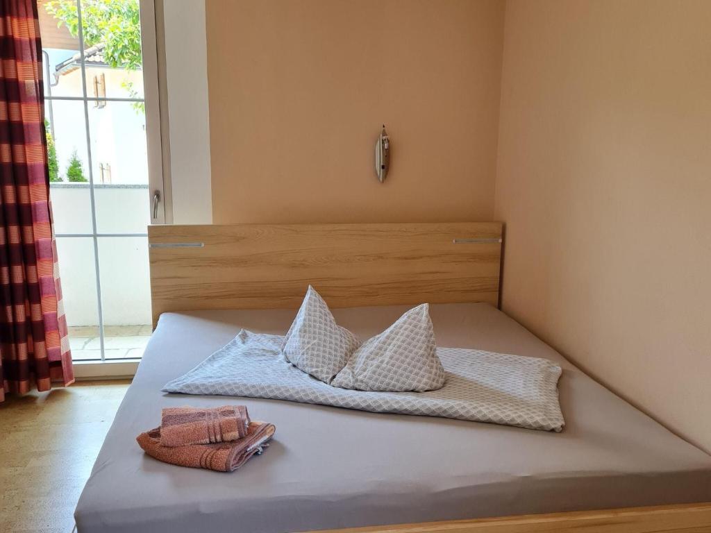 Postel nebo postele na pokoji v ubytování Holiday flat, Aschau