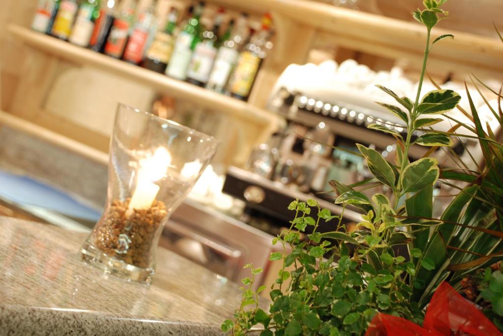 Nápoje v ubytovaní Boscone Suite Hotel