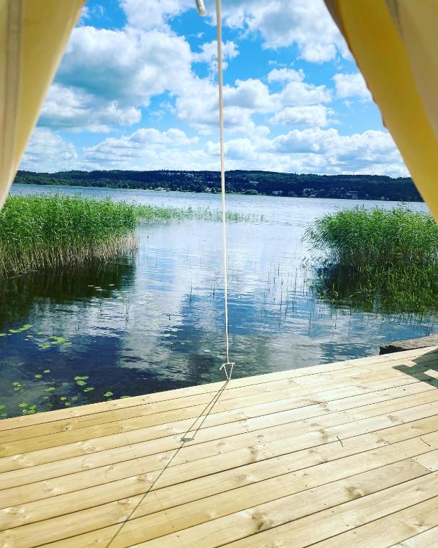a view of a lake from the inside of a boat at Björkudden glamping in Fristad
