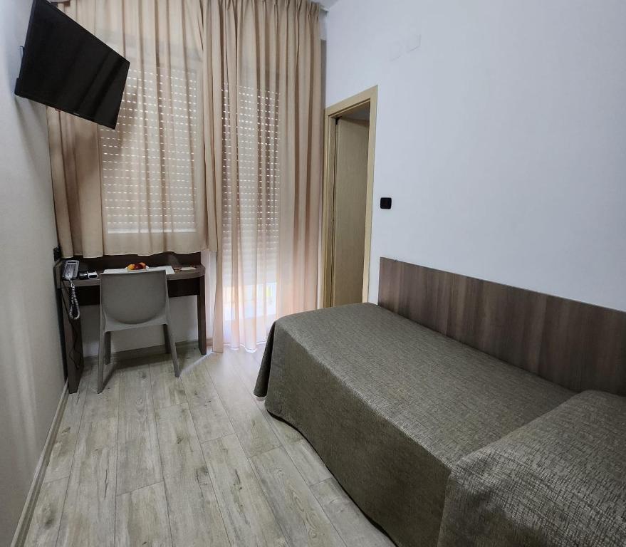 TV a/nebo společenská místnost v ubytování Hotel Miramare Dipendenza