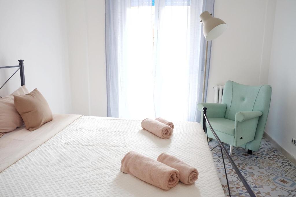 Postel nebo postele na pokoji v ubytování NERI Rooms