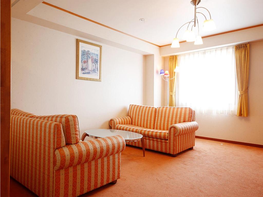 Posezení v ubytování Hotel BELLMARE ホテルベルマーレ