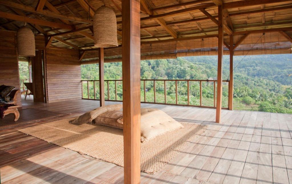 Balkón nebo terasa v ubytování Room Kalimatan in Bukit Cottage