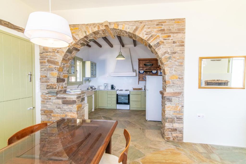 Kuchyň nebo kuchyňský kout v ubytování ReGenesis Villas