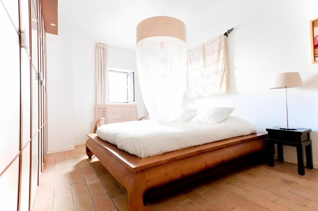 Posteľ alebo postele v izbe v ubytovaní Exclusive apt with stunning patio in the center