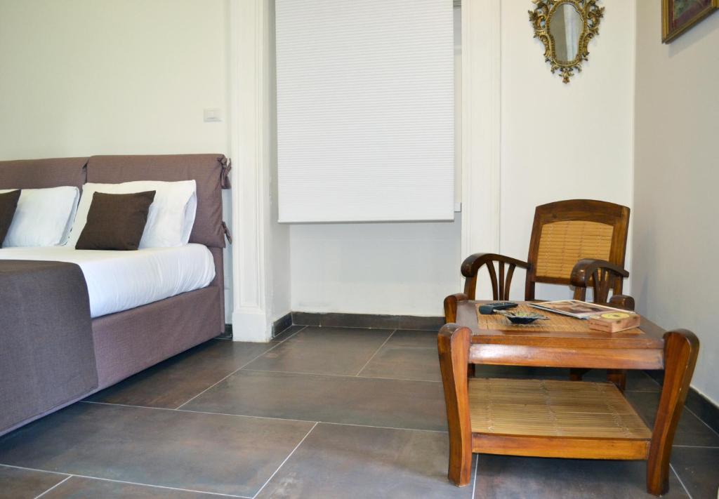 A bed or beds in a room at questo rinascimento CASA NEWMAN