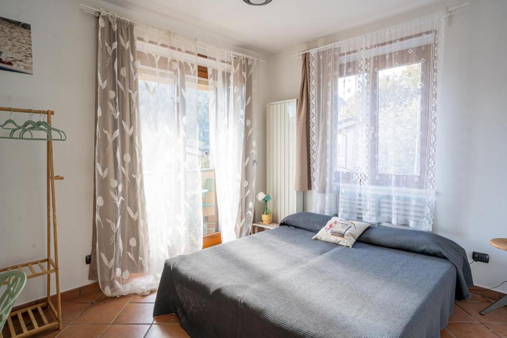 Łóżko lub łóżka w pokoju w obiekcie Casa Furia