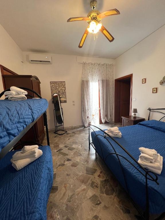 A bed or beds in a room at Casa Aurora