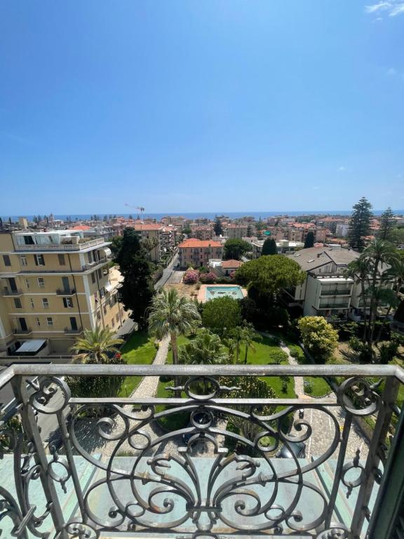 a view of a city from a balcony at APPARTAMENT LONDON PARK in Bordighera