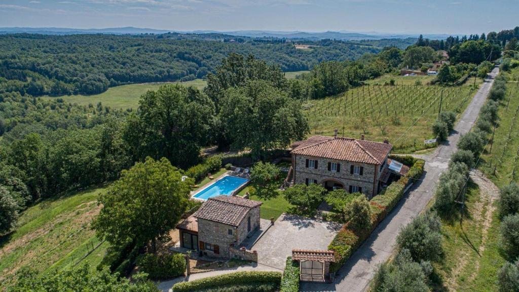 an aerial view of an estate with a swimming pool at Podere San Carlo in Siena