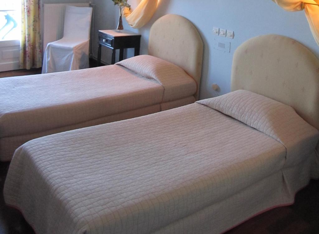 Postel nebo postele na pokoji v ubytování Levant Hotel