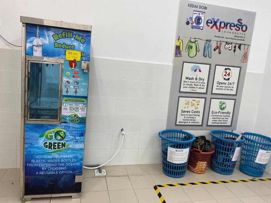 a bathroom with buckets and a stall with a shower at Simfoni Tower 3R2B 8pax @C180@Chr Trader Square in Seri Kembangan