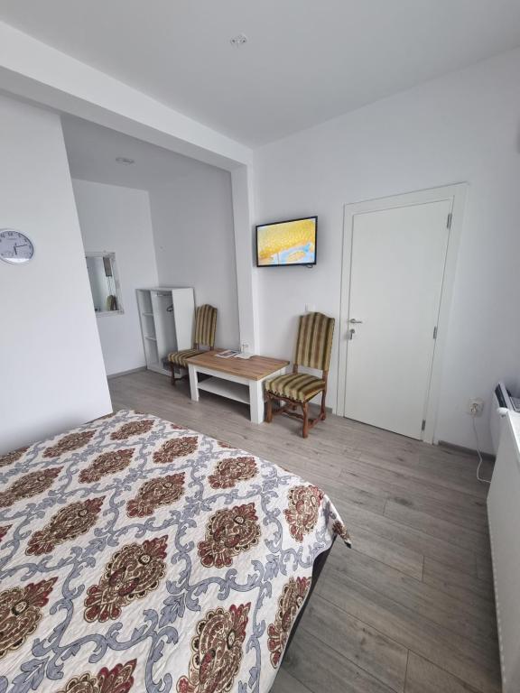 Postel nebo postele na pokoji v ubytování Casa Musceleana