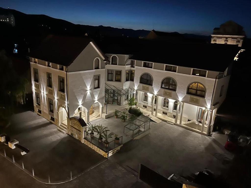 an overhead view of a large white building with lights at Carolina Heritage in Alba Iulia