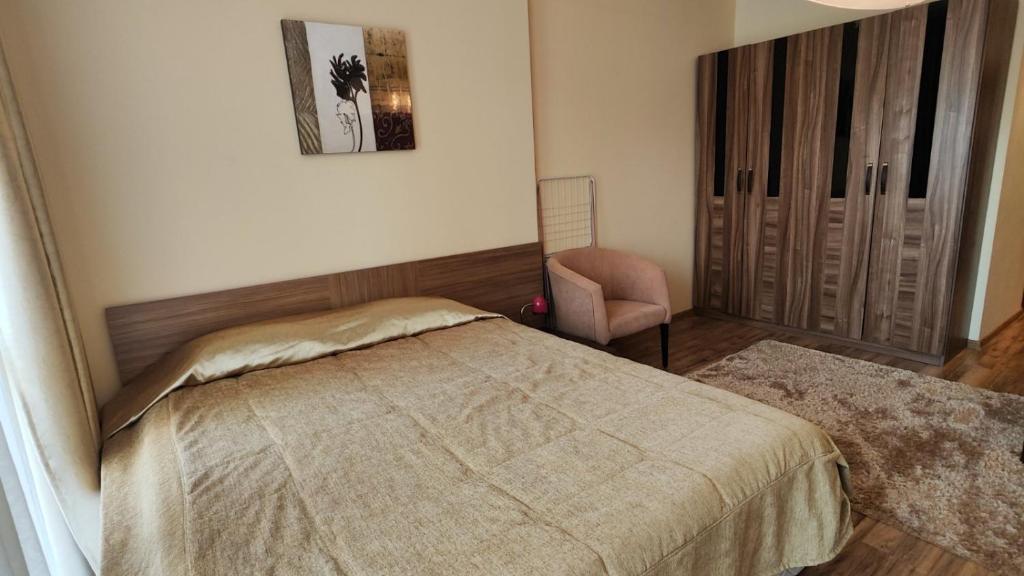 Postel nebo postele na pokoji v ubytování Europroperties Golden Line