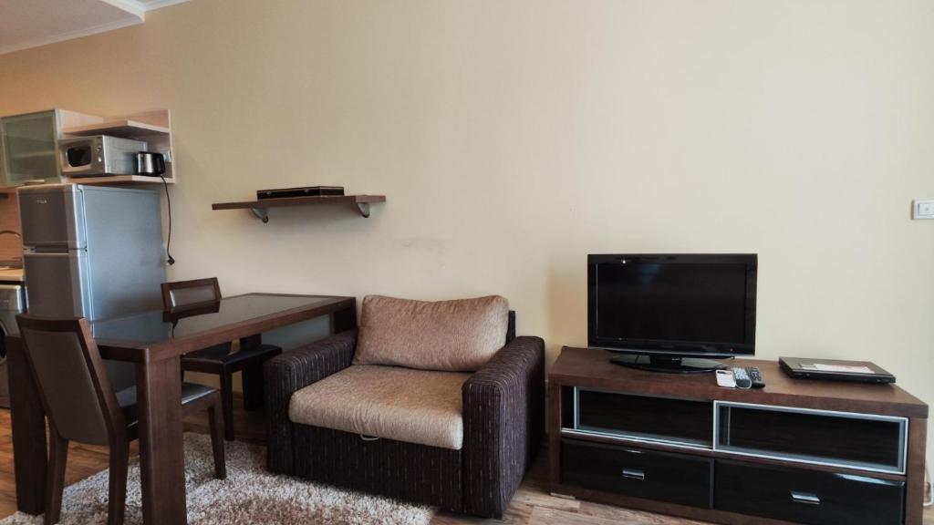 TV a/nebo společenská místnost v ubytování Europroperties Golden Line