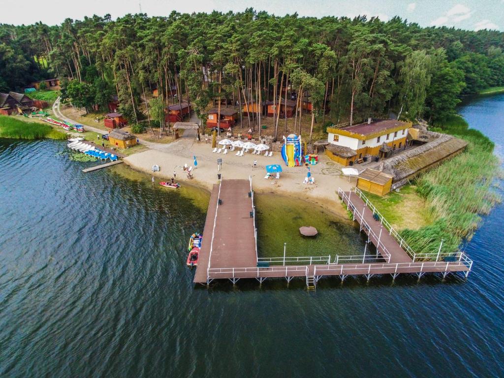 an aerial view of a dock in the water at Gród Piasta in Gąsawa
