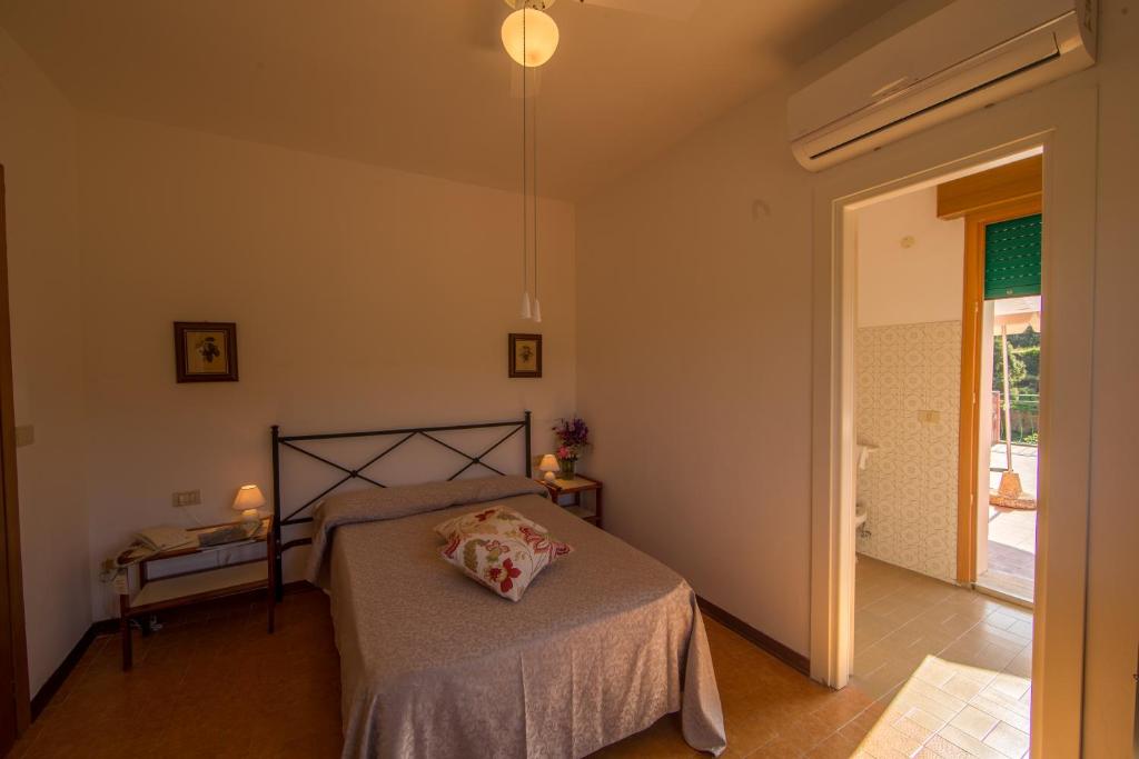 Postel nebo postele na pokoji v ubytování Hotel La Feluca