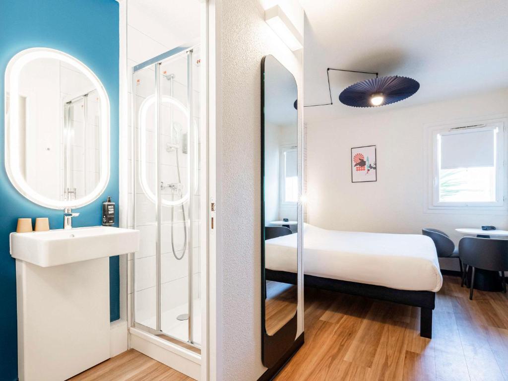 Postel nebo postele na pokoji v ubytování ibis Perpignan Sud Saint Charles